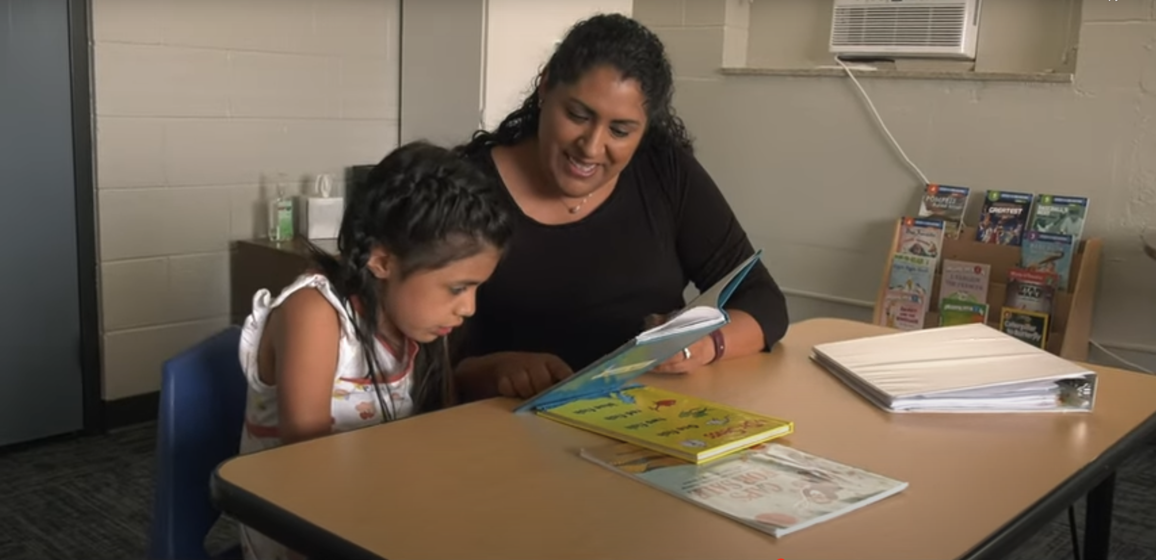 mentor helping student featured on the youth after schools programs landing page